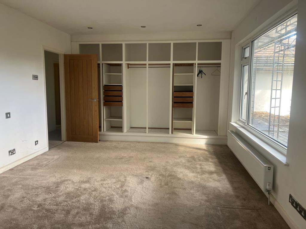Lot: 146 - DETACHED FOUR-BEDROOM BUNGALOW WITH DOUBLE GARAGE AND GOOD SIZE GROUNDS FOR UPDATING - Master bedroom